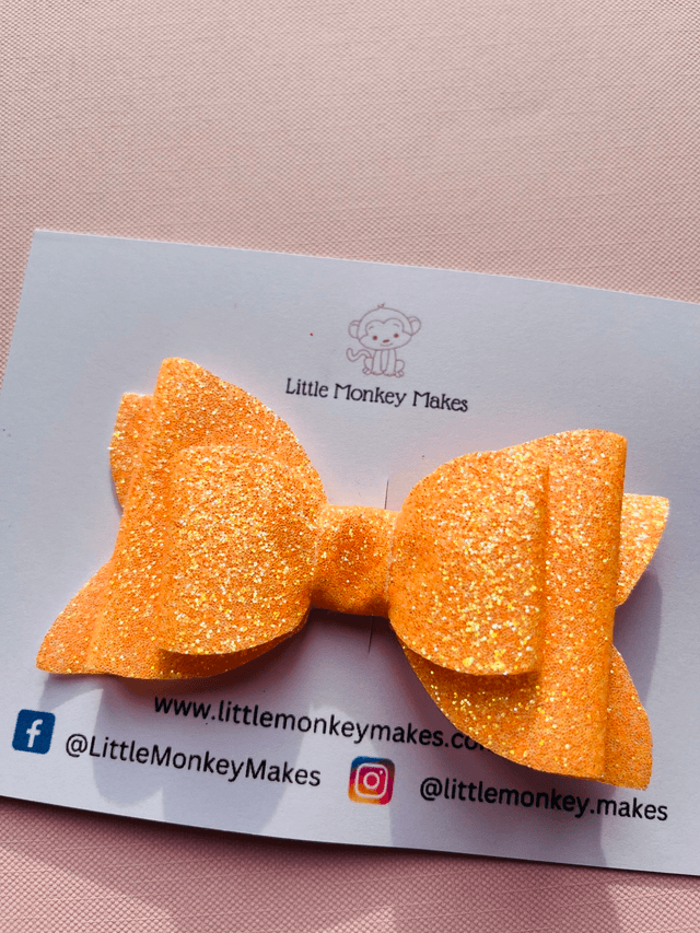 Orange glitter hair bow