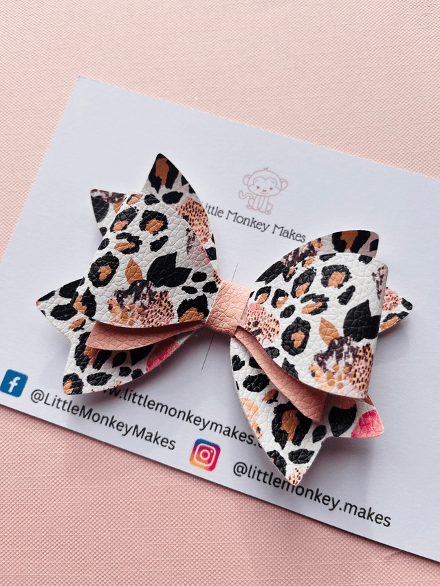 Pink animal print bow