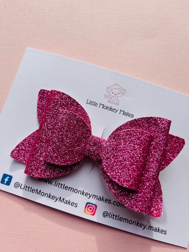 Pink glitter bow
